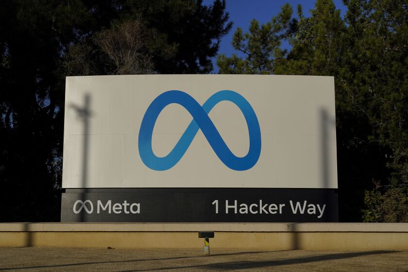 FILE - Meta's logo can be seen on a sign at the company's headquarters in Menlo Park, Calif., on Nov. 9, 2022. Irish regulators slapped Facebook parent Meta with a 265 million euro ($277 million) fine Monday, Nov. 28, 2022 the company's latest punishment for breaching strict European Union data privacy rules. (AP Photo/Godofredo A. Vásquez, File)