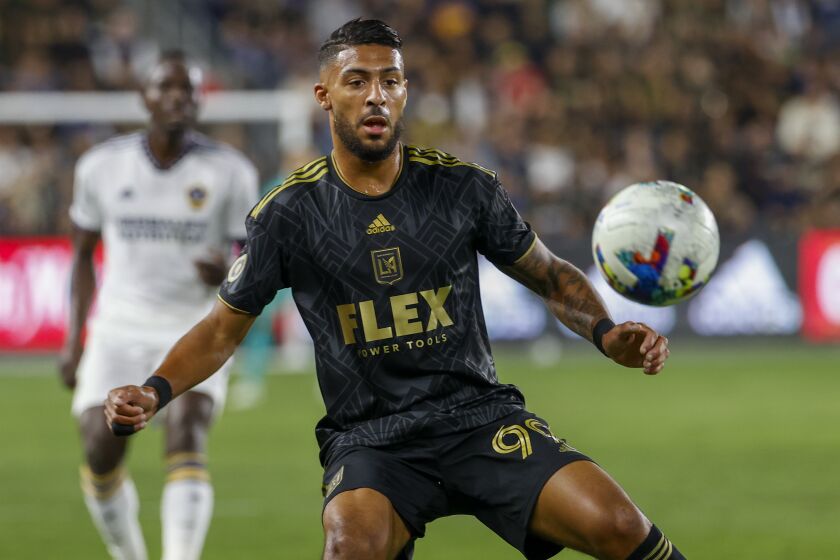 LAFC forward Denis Bouanga controls the ball against the Galaxy during an MLS playoff match Oct. 20, 2022.