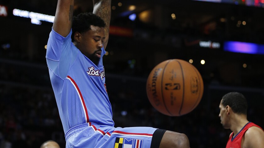 Clippers center DeAndre Jordan dunks during the team's 107-100 win over the New Orleans Pelicans at Staples Center on March 22, 2015.