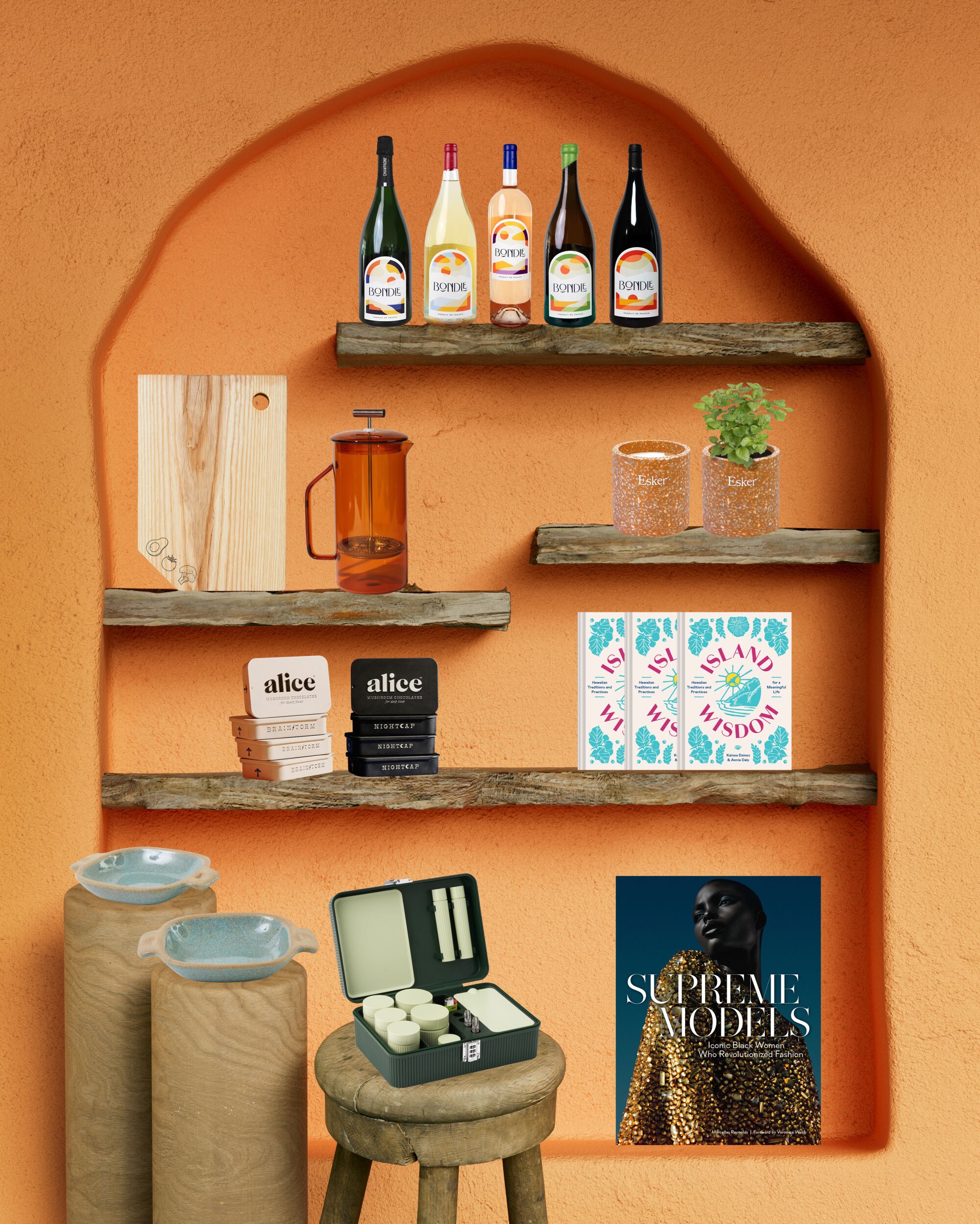 terracotta built-in with wood shelves and gift guide products sitting on each shelf