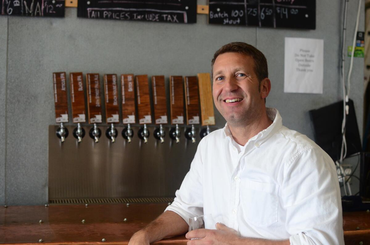 Strand Brewing's co-founder Rich Marcello, with taps.