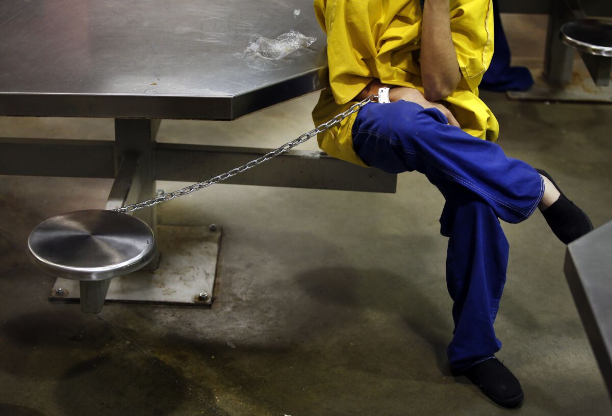 Sometimes inmates are chained to tables for security reasons in the High Observation Mental Health Housing unit at the Twin Towers Correctional Facility in Los Angeles. Officials in the jail are trying to correct issues in the facility that can lead to extreme depression and suicide.