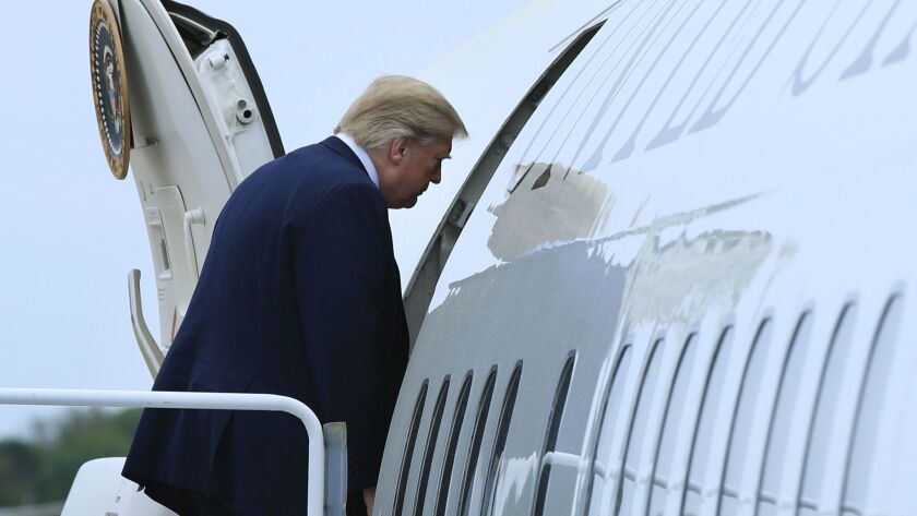 President Trump boards Air Force One at Andrews Air Force Base, Md., on May 5.