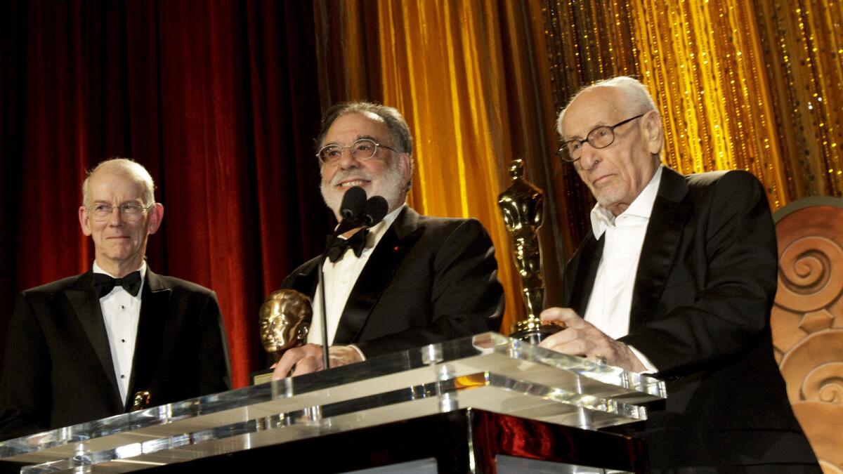Film historian and preservationist Kevin Brownlow, left, with Francis Ford Coppola and Eli Wallach during the 2010 Governors Awards in Hollywood in 2010.