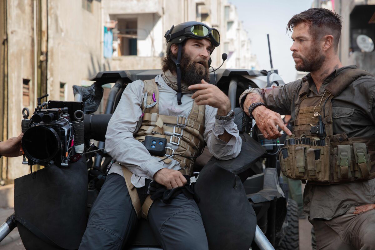 Hemsworth and Sam Hargrave on the set of "Extraction"