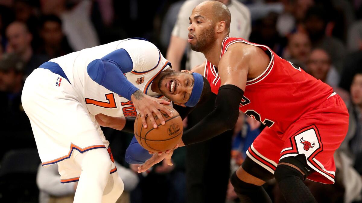 Forward Carmelo Anthony (7) is staying with the Knicks but Bulls forward Taj Gibson appears to be heading to the Thunder on trade-deadline day.