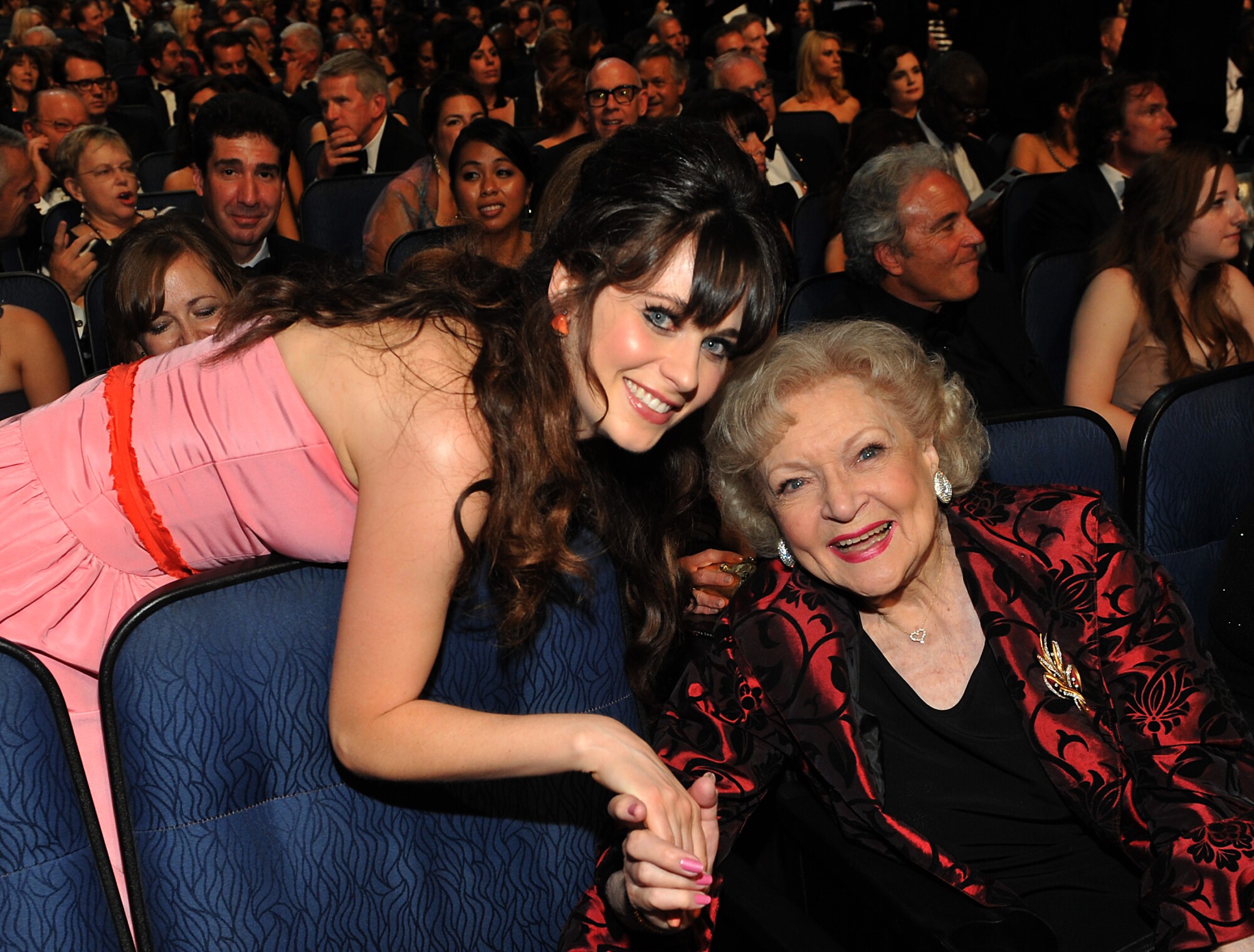 Zooey Deschanel and Betty White during Emmy Awards at Nokia Theatre L.A. Live on September 18, 2011.