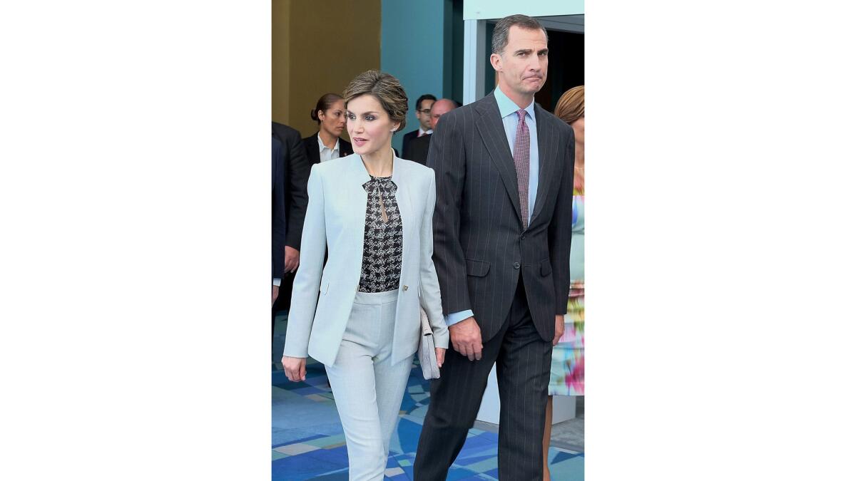 Felipe VI of Spain, right, and Queen Letizia arrive for the VII International Congress of the Spanish Language in San Juan, Puerto Rico.