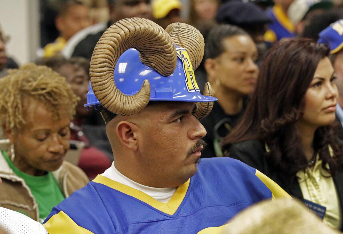 Rams fan Enrique Lopez attends the Feb. 24 Inglewood City Council meeting on a new stadium in the city.