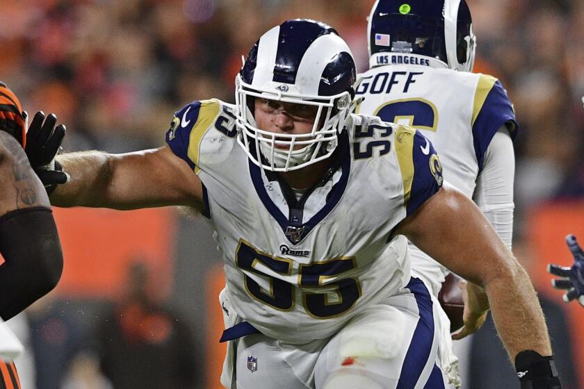 Rams center Brian Allen blocks during the second half of an NFL football game against the Cleveland Browns