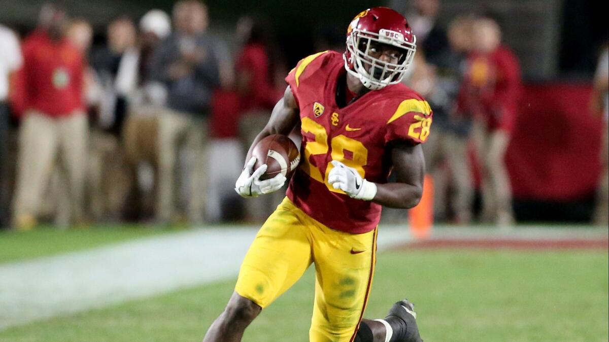 USC running back Aca'Cedric Ware looks for room to run against Cal.