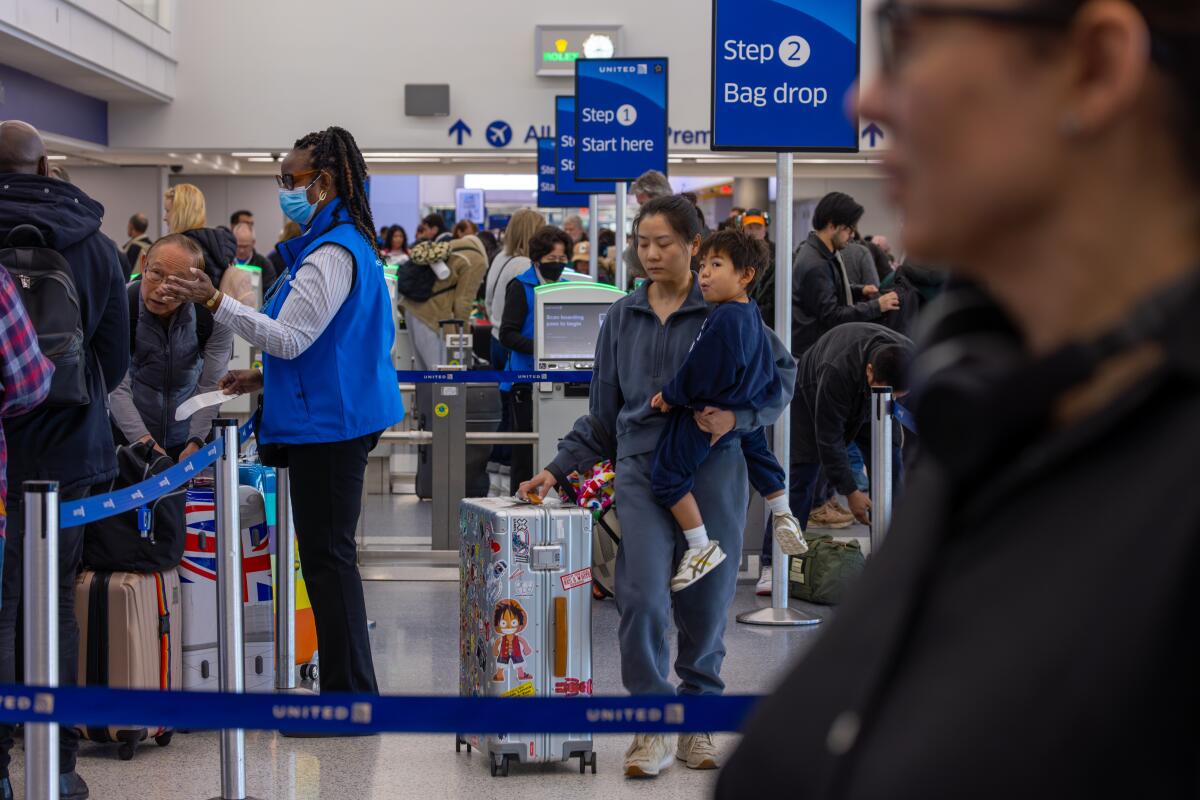 Passengers at Los Angeles International Airport on Wednesday.