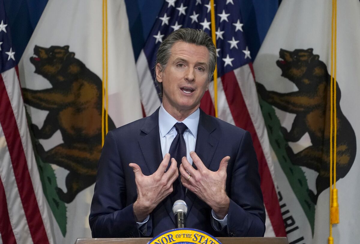 Gov. Gavin Newsom speaks during a news conference in Sacramento on Jan. 8.