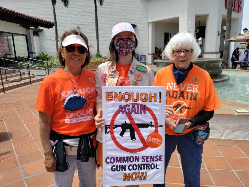 NeverAgainCA members met with local residents outside Vons at the Lomas Santa Fe Plaza in Solana Beach.