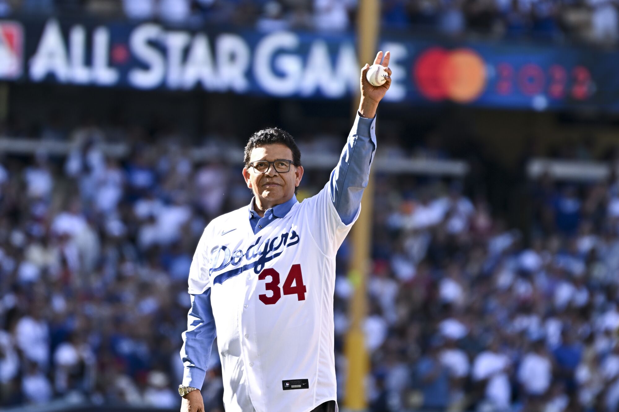 Dodgers legend Fernando Valenzuela prepares to throw out the first pitch of the 2022 MLB All-Star Game at Dodger Stadium.