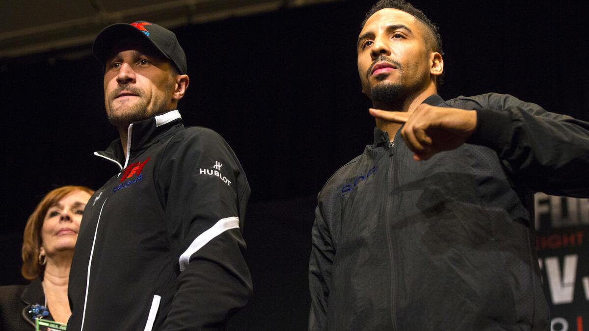 Sergey Kovalev, left, and Andre Ward speak at a Las Vegas news conference Thursday.