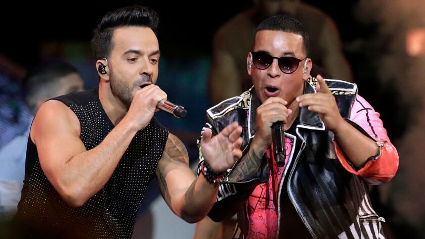 Luis Fonsi, left, and Daddy Yankee perform at the Latin Billboard Awards in Coral Gables, Fla., in April.