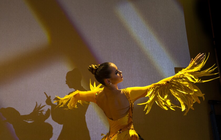 Arynne Cole, 15, of Provo, Utah, practices for the California Open DanceSport Championships in Costa Mesa on Friday.