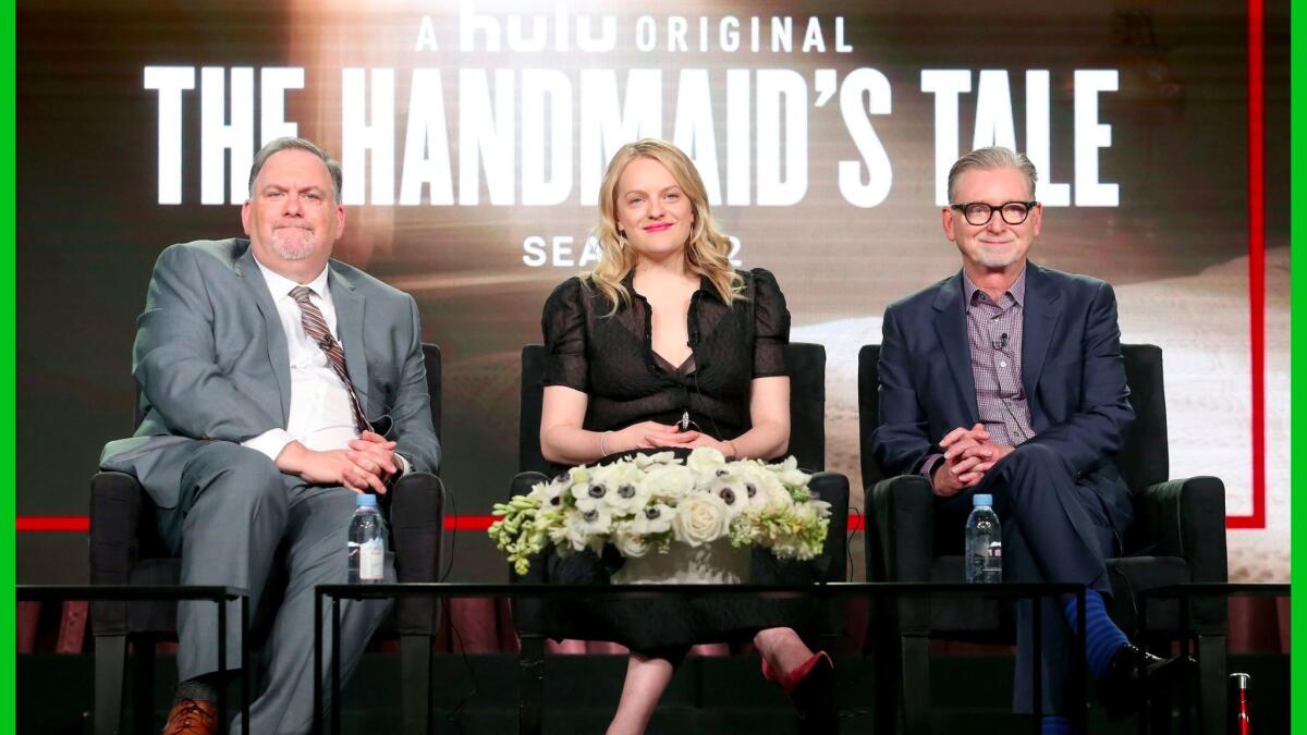 Discussing Season 2 of "The Handmaid's Tale" are showrunner-executive producer Bruce Miller, left, executive producer-actor Elisabeth Moss and executive producer Warren Littlefield.