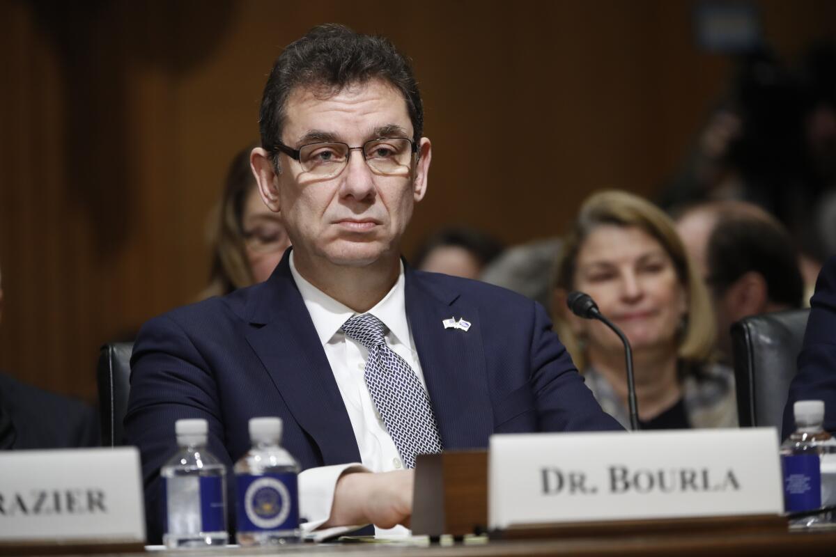 Pfizer Chief Executive Albert Bourla at a Senate committee hearing