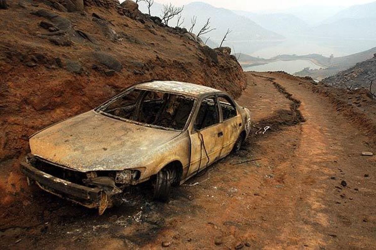 The remains of two people were found in the shell of this car. Authorities believe they tried to get to a nearby reservoir to escape the flames in the 2003 Cedar fire near the Lake View Hills Estates area of San Diego County.