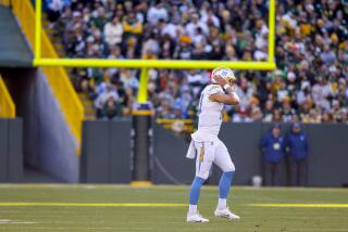Chargers quarterback Justin Herbert (10) during a road game against the Green Bay Packers.