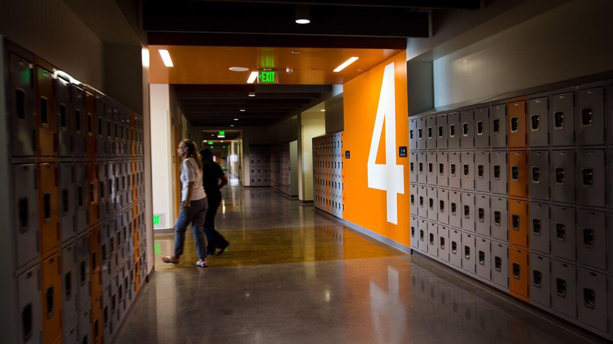 A nearly empty hallway at the new Maywood Center for Enriched Studies. The campus was envisioned to combat severe overcrowding, but as enrollment declined, officials made the school a magnet to attract students from outside the area, a strategy that seems to have worked.