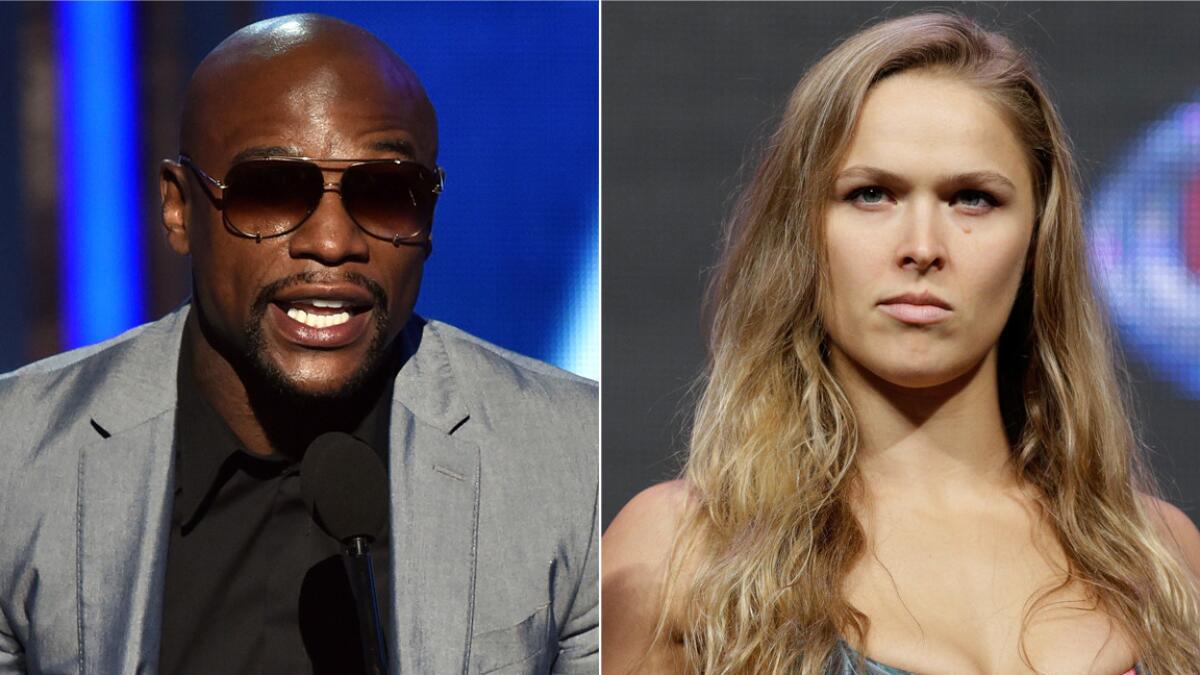 Floyd Mayweather Jr., left, claims he doesn't know anything about UFC women's bantamweight champion Ronda Rousey.