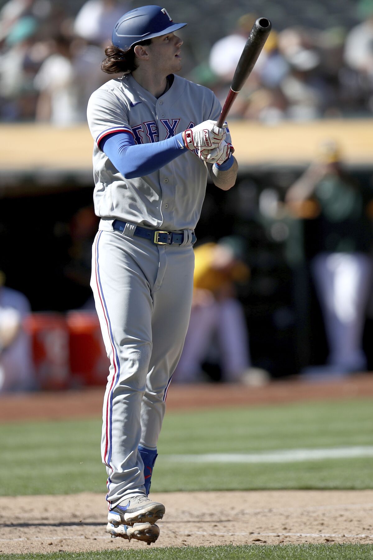 Texas Rangers' Jonah Heim (28) watches his two-run home run in the eighth inning of a baseball game against the Oakland Athletics, Saturday, Sept. 11, 2021, in Oakland. (AP Photo/Scot Tucker)