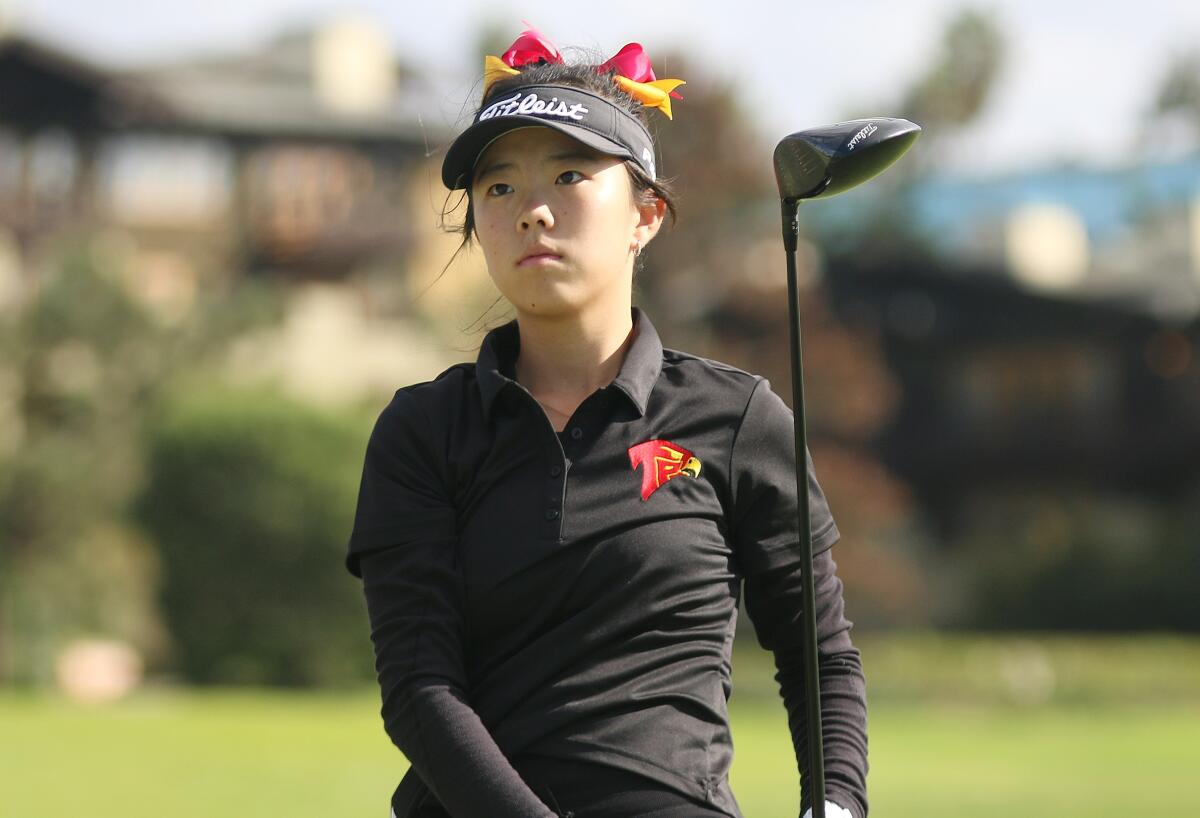 Low scorer for the Falcons in round one was junior Annie Zhang.