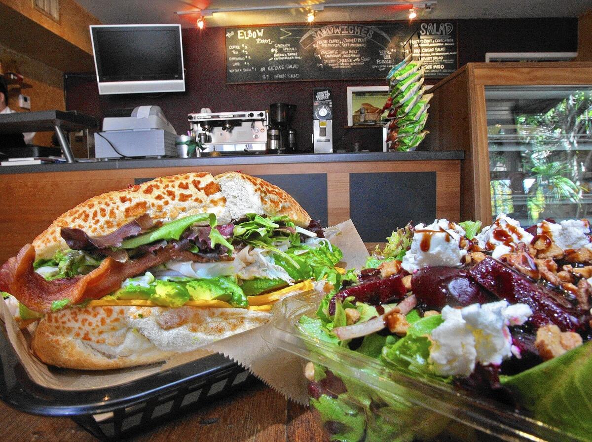 A bacon and turkey sandwich with avocado, and a roasted beet and goat cheese salad with canadian walnuts, mixed greens and balsamic vinaigrette at Thee Elbow Room, in Montrose, on Thursday, April 3, 2014. The restaurant, which opened in December, used to be a coffee shop and is now a sandwich, salad, and coffee shop, and they hope to get their beer and wine license to curve away from coffee altogether.