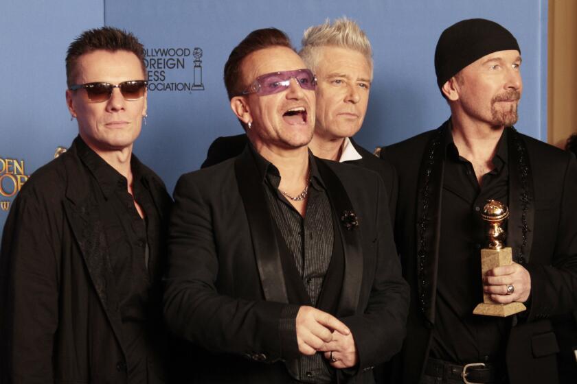 U2 (Larry Mullen Jr., left, Bono, Adam Clayton and the Edge) won the Golden Globe for best original song with "Ordinary Love," from "Mandela: Long Walk to Freedom."