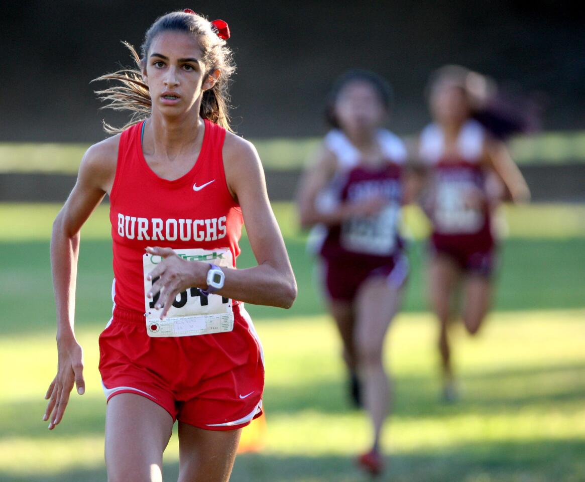 Burroughs High School's Emily Virtue won the varsity girls cross country Pacific League Finals at Arcadia County Park in Arcadia on Thursday, November 5, 2015.