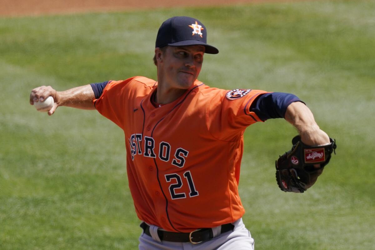 Houston Astros starting pitcher Zack Greinke delivers against the Angels on April 6.