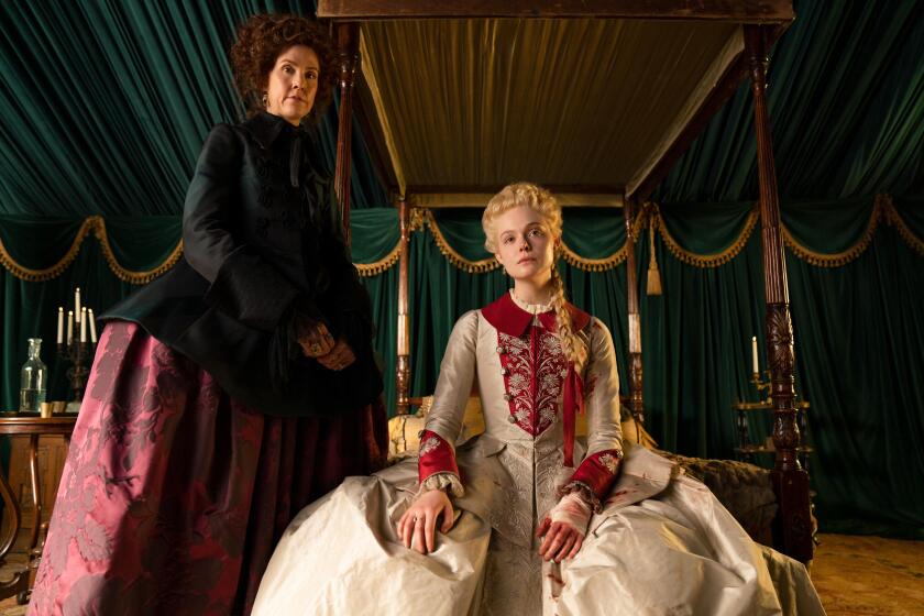 The Great -- "Wedding" - Episode 210 -- Catherine makes a devastating discovery about Peter before travelling to the war front for a meeting with the Sultan. Peter considers his options now Catherine knows his secret and all parties come together for a final showdown at Marial's wedding. Aunt Elizabeth (Belinda Bromilow) and Catherine (Elle Fanning), shown. (Photo by: Gareth Gatrell/Hulu)