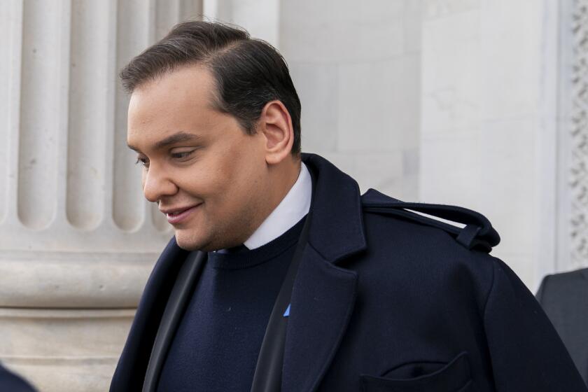 FILE - Rep. George Santos, R-N.Y., leaves the Capitol after being expelled from the House of Representatives, Friday, Dec. 1, 2023, in Washington. (AP Photo/Stephanie Scarbrough)