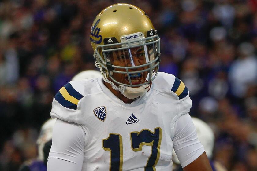 UCLA quarterback Brett Hundley after scoring a touchdown during the Bruins' 44-30 victory over Washington on Saturday.