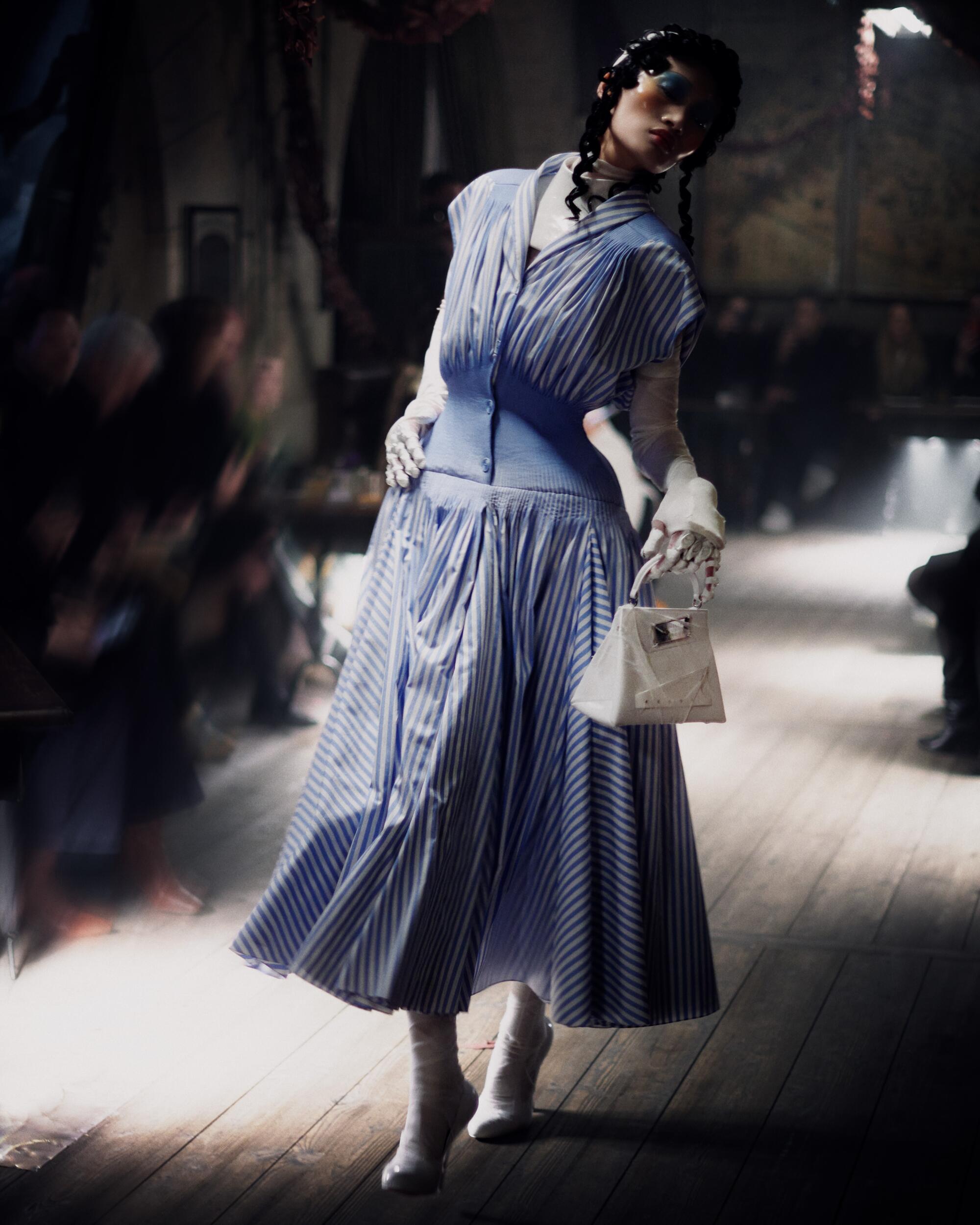 Maison Margiela Spring/Summer 24 Haute Couture runway show. Movement director: Pat Boguslawski; Model: Yilan Hua