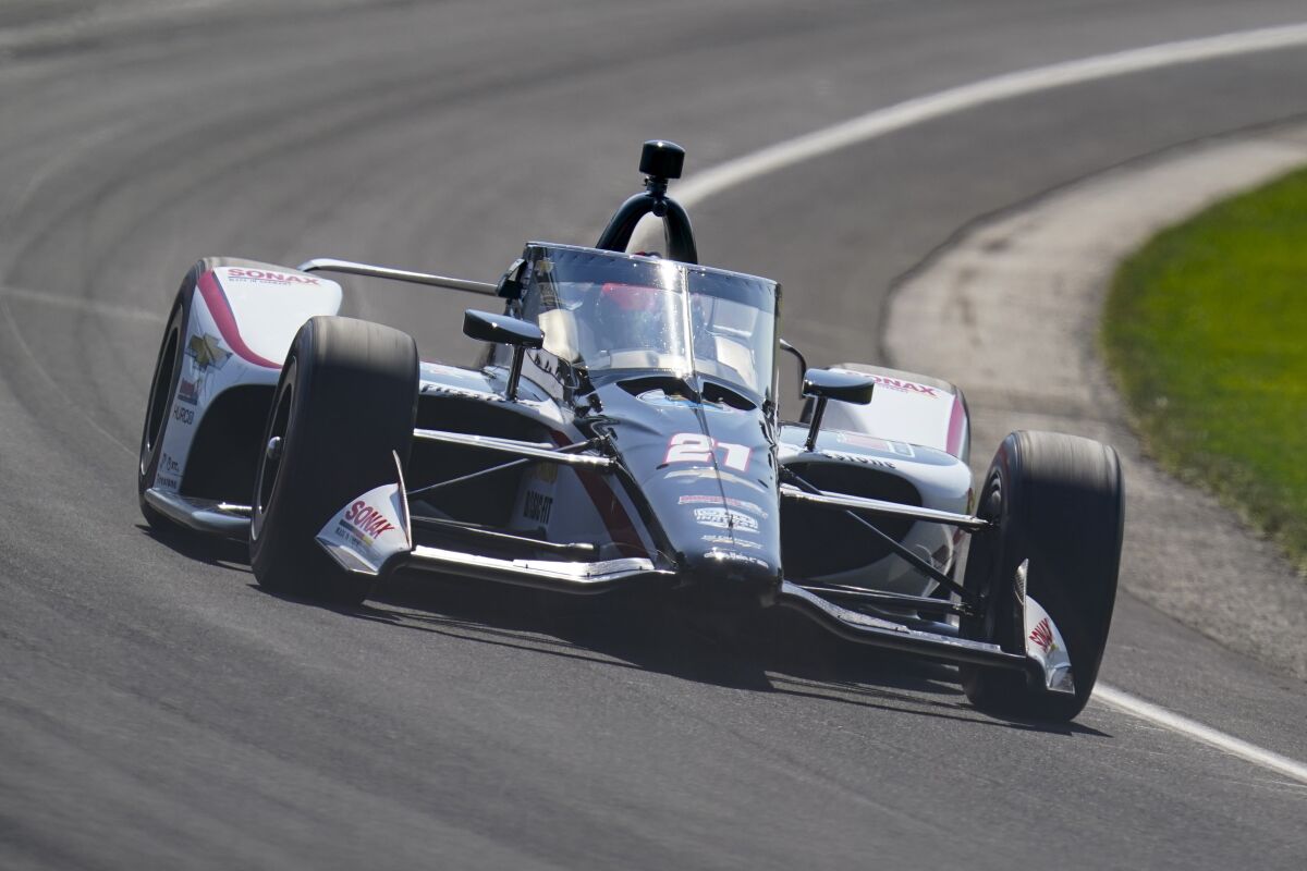 Rinus VeeKay, of the Netherlands, drives through the third turn during qualifying for the Indianapolis 500 auto race at Indianapolis Motor Speedway in Indianapolis, Saturday, Aug. 15, 2020. (AP Photo/Michael Conroy)