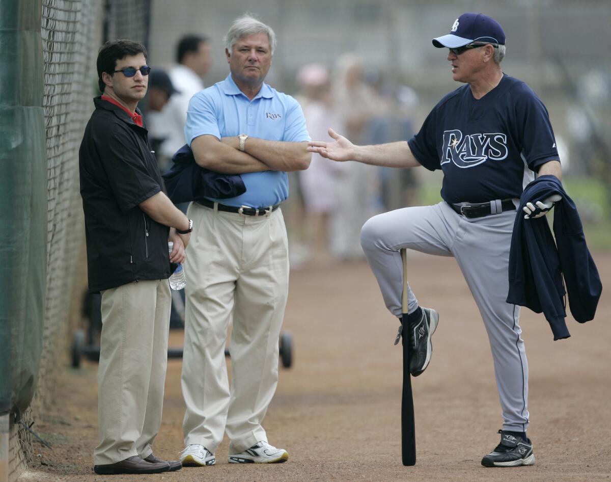 Joe Maddon, right, talks with Andrew Friedman, left, and Gerry Hunsicker in 2008, when they were all with the Tampa Bay Rays.