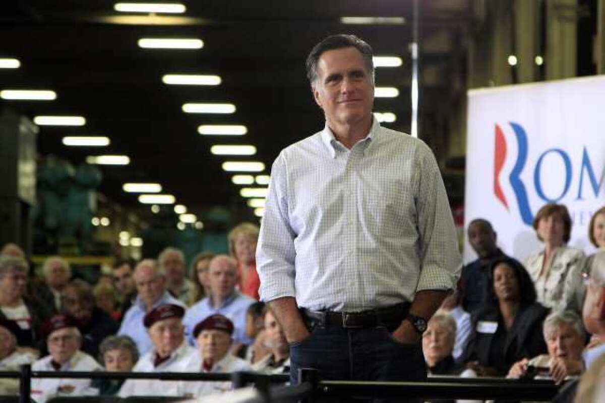 Mitt Romney listens to a question from a supporter at a town hall-style meeting in Euclid, Ohio, on Monday.