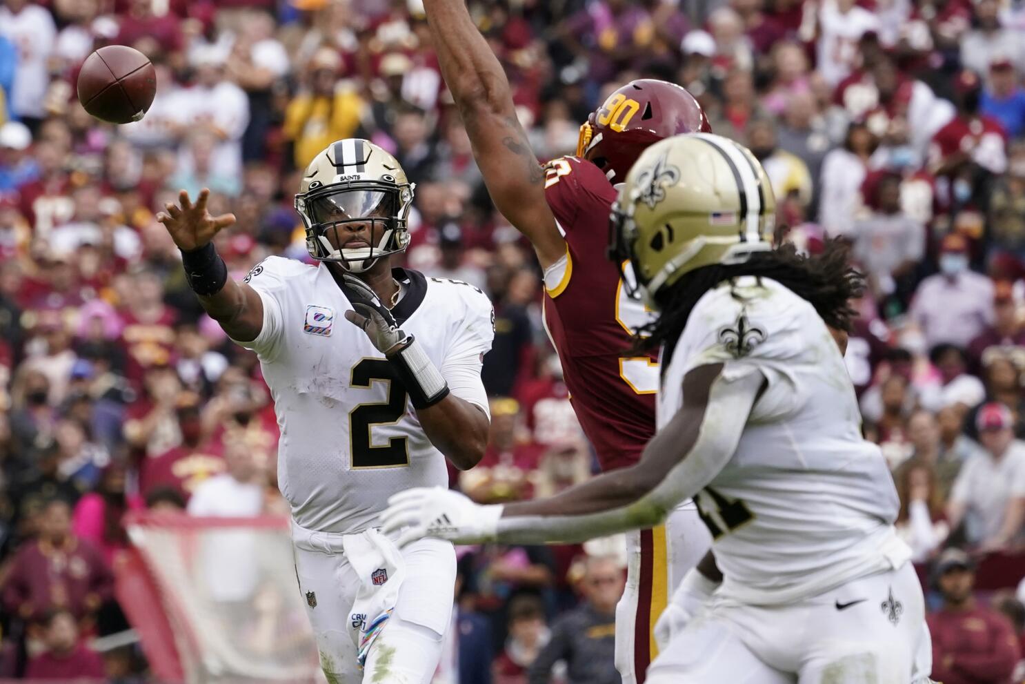 Alvin Kamara of the New Orleans Saints runs with the ball against