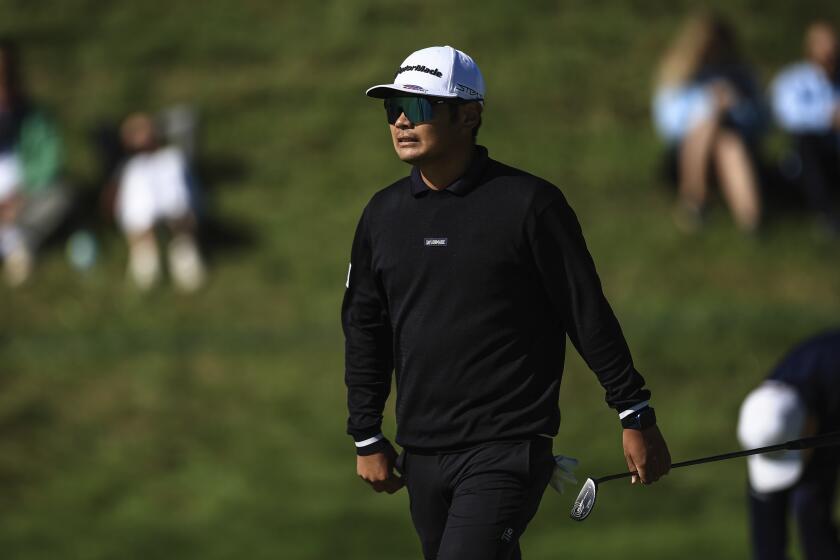 Ryo Hisatune of Japan watches his ball on the ninth hole during the fourth round the French Golf Open tournament at Le Golf National in Saint-Quentin-en-Yvelines, outside Paris, France, Sunday, Sept. 24, 2023. The course will host the Paris 2024 Golf competitions. (AP Photo/Aurélien Morissard)
