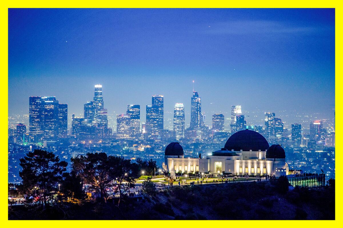 Dusk settles in over the city in a view from above the Griffith Park Observatory.