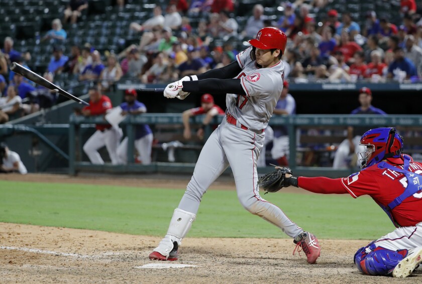 Angels designated hitter Shohei Ohtani breaks his bat.