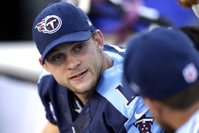 Jake Locker on the sideline during the 2013 season when he played quarterback for the Tennessee Titans.