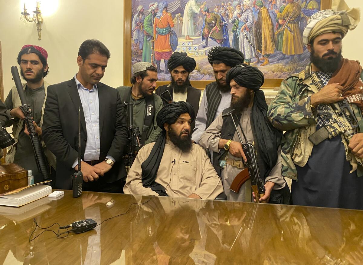 Taliban fighters took control of the presidential palace in Kabul after President Ashraf Ghani fled on Sunday.