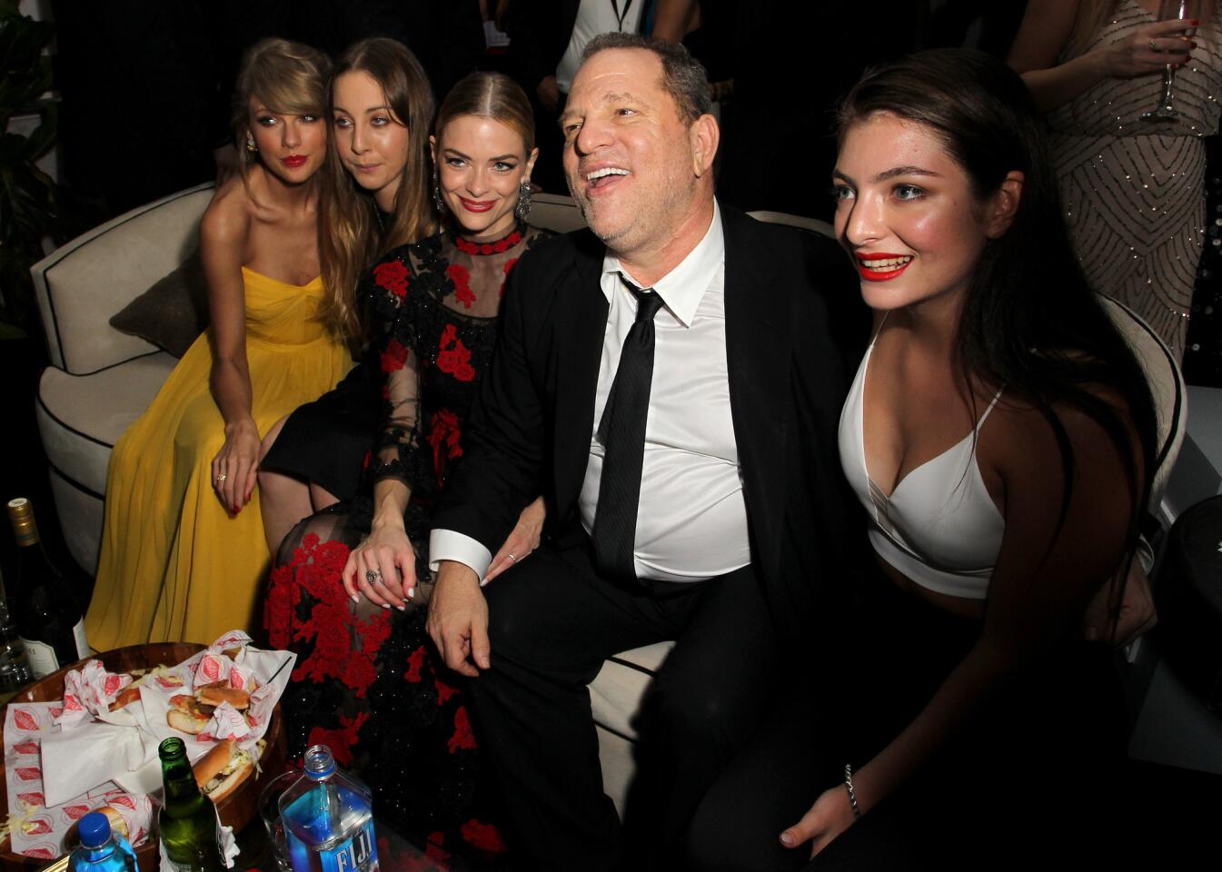 Recording artist Taylor Swift, musician Este Haim, actress Jaime King, producer Harvey Weinstein and recording artist Lorde attend the Weinstein Co. & Netflix's 2015 Golden Globes afterparty at the Beverly Hilton Hotel.