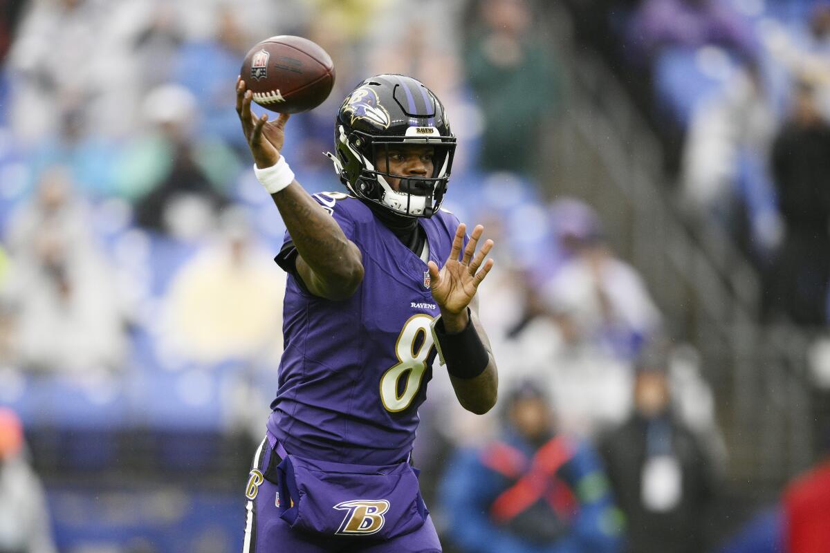 Baltimore Ravens quarterback Lamar Jackson passes against the Rams on Sunday.