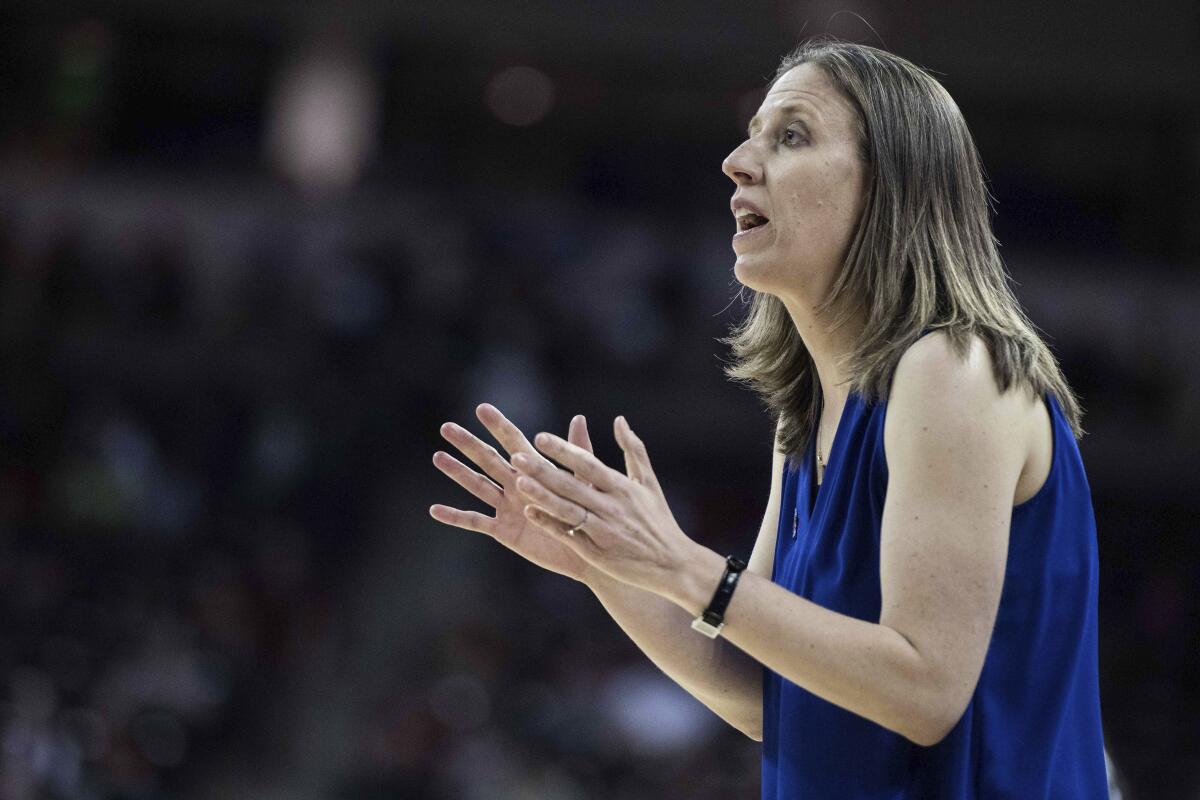 California head coach Lindsay Gottlieb raises her hands